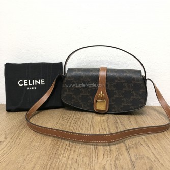 CELINE Clutch on Strap Tabou in Triomphe Canvas and Calfskin – GHW