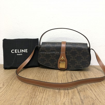 CELINE Clutch on Strap Tabou in Triomphe Canvas and Calfskin – GHW