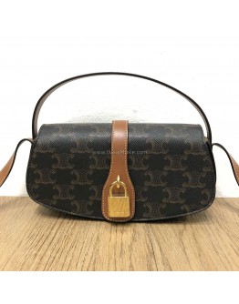CELINE Clutch on Strap Tabou in Triomphe Canvas and Calfskin – GHW