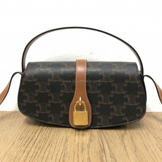 CELINE Clutch on Strap Tabou in Triomphe Canvas and Calfskin – GHW