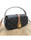 CELINE Clutch on Strap Tabou in Triomphe Canvas and Calfskin – GHW