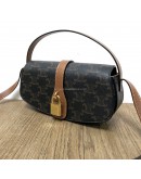 CELINE Clutch on Strap Tabou in Triomphe Canvas and Calfskin – GHW
