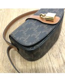 CELINE Clutch on Strap Tabou in Triomphe Canvas and Calfskin – GHW