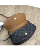 CELINE Clutch on Strap Tabou in Triomphe Canvas and Calfskin – GHW