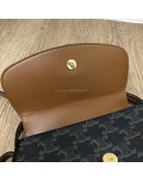CELINE Clutch on Strap Tabou in Triomphe Canvas and Calfskin – GHW