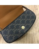 CELINE Clutch on Strap Tabou in Triomphe Canvas and Calfskin – GHW