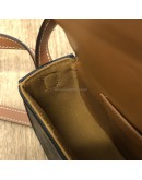 CELINE Clutch on Strap Tabou in Triomphe Canvas and Calfskin – GHW