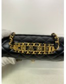 CHANEL 24C Mini Classic Flap with Top Handle in Black Goatskin – GHW (Microchip)