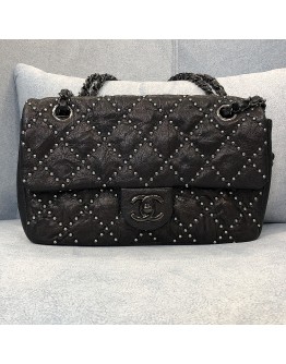CHANEL Medium Classic Studded Single Flap Bag in Black Aged Calfskin 