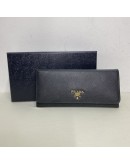 PRADA Bifold Long Wallet in Black Saffiano Leather – GHW
