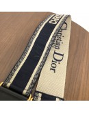 CHRISTIAN DIOR Mini Saddle Bag in Blue Oblique Jacquard with Embroidered Strap – Antique Gold Hardware