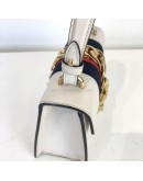 GUCCI Sylvie Mini Top Handle Bag in Off White Calfskin with Twisted Web Strap & Leather Strap – GHW