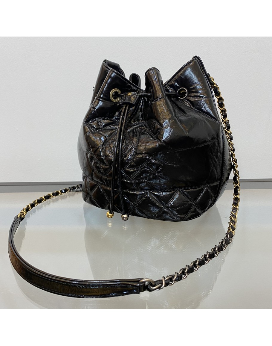 CHANEL CC Drawstring Mini Bucket Bag in Black Shiny Aged Calfskin – Dual  Tone Hardware (30 Series)